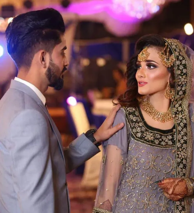 Happily married couple during their wedding reception celebration